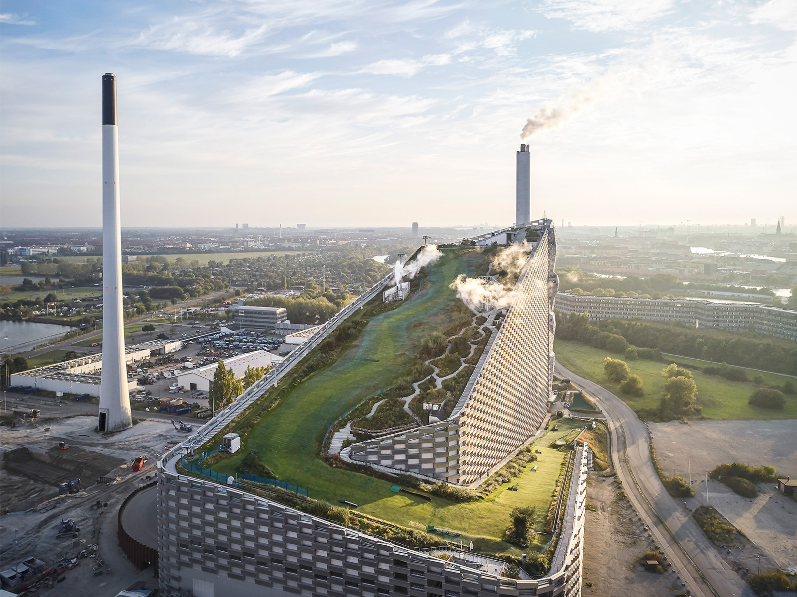 An energy-from-waste plant with an outdoor sports center on its roof, Amager Bakke is an inspiration to WAT, as it is integrated into the urban ecosystem. (Credit photo Copenhill Hufton&Crow / ARC)