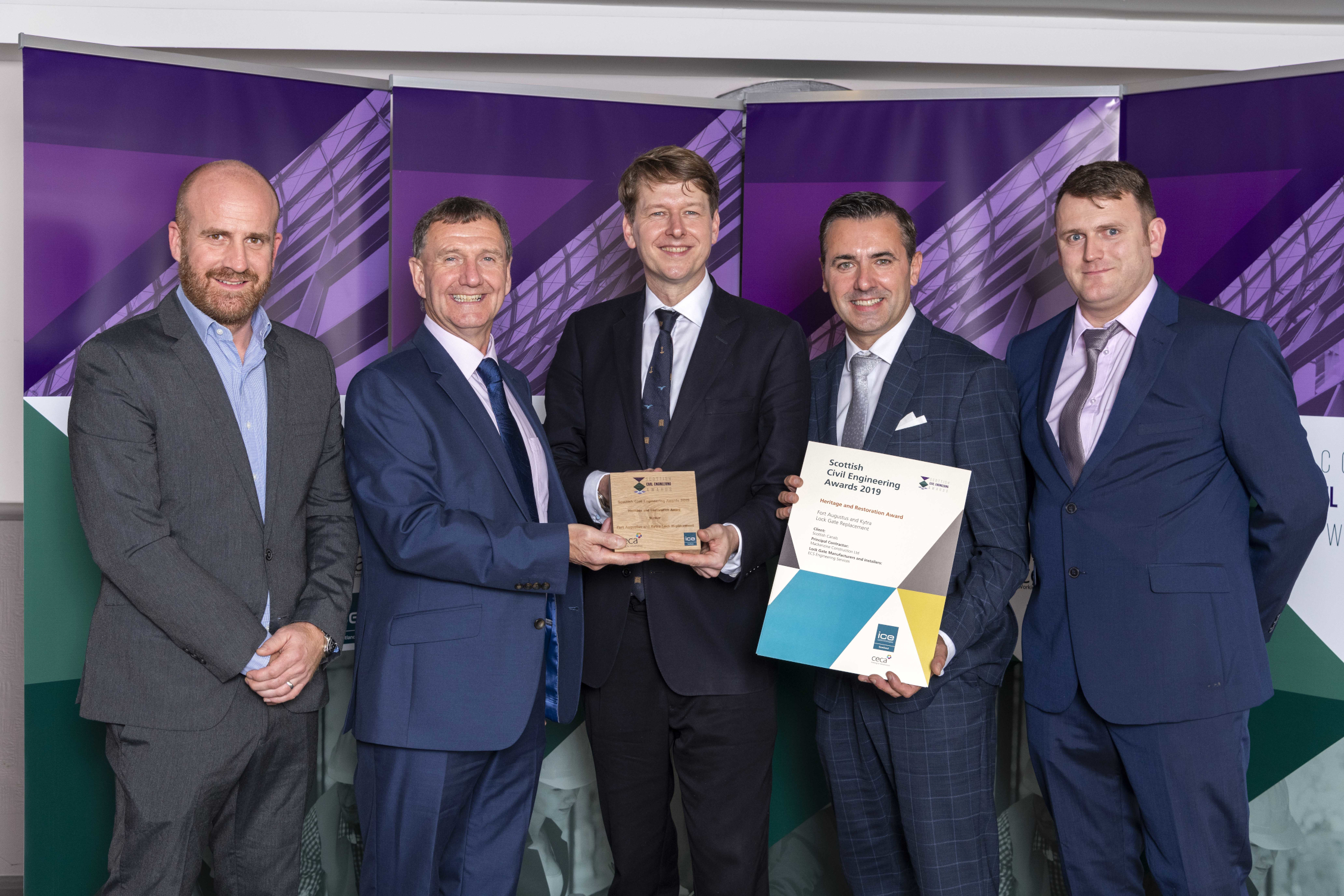 ECS Engineering Services and Mackenzie Construction receive the 2019 CECA (Civil Engineering Contractors’ Association) Heritage and Restoration Award from Robin Walker MP.