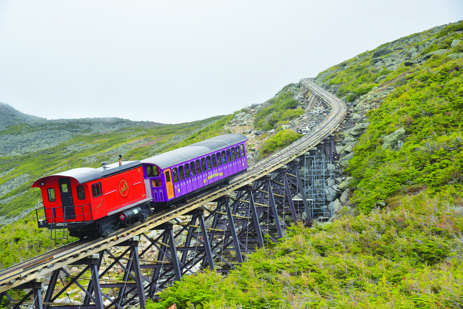 The Mount Washington Cog Railway in New Hamp- shire has been transporting visitors to the summit, 6,288 ft. above sea level, since 1869. The 6-mile, 3-hour round trip features an average grade of 25% (Photo courtesy of Mt. Washington Cog Railway)