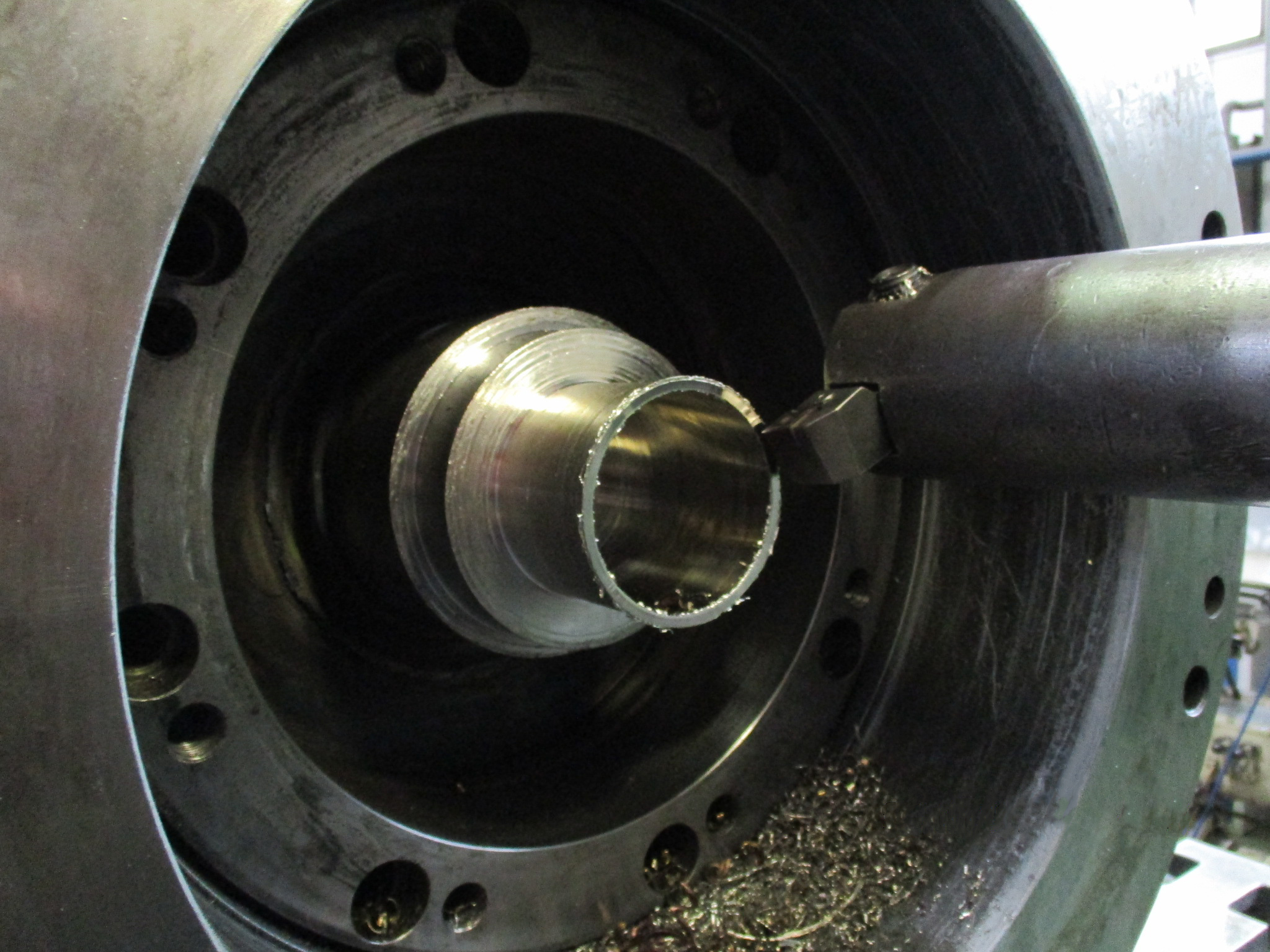 The initial investigation found that the balance piston and sleeve were welded together and this would require the shaft to be cut off and drilled out to separate the parts